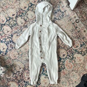 Cozy White Knit Baby Onesie